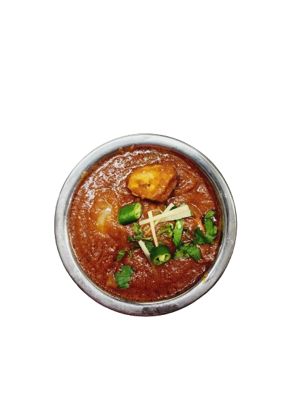 A excellent bowl of Chicken Tikka Masala with chillies and ginger garnishing