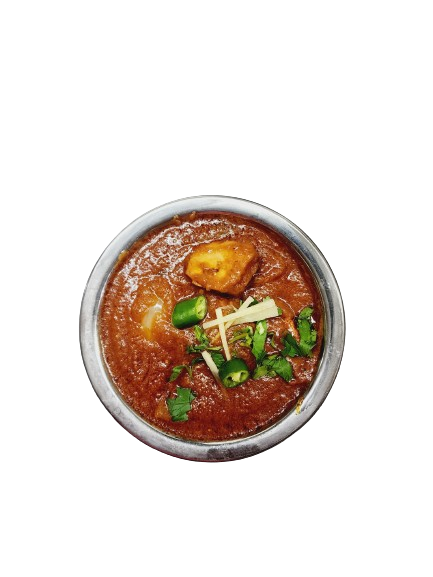 A excellent bowl of Chicken Tikka Masala with chillies and ginger garnishing