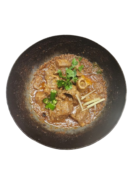 A tasty dish of Goat Charsi Karahi with garnishing of coriander and ginger