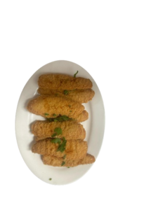 Ten crispy chicken fillets garnished with herbs served on a tray