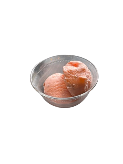 Two scoops of rose falooda ice cream delicately presented in a glass bowl.