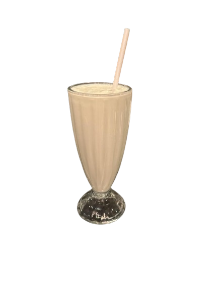 a glass of sweet vanilla shake with straw