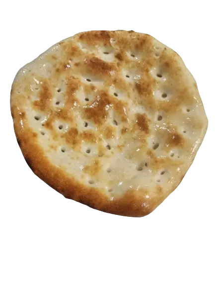 A butter naan on white background