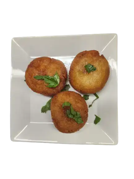 3 pieces of aloo tikki on white plate